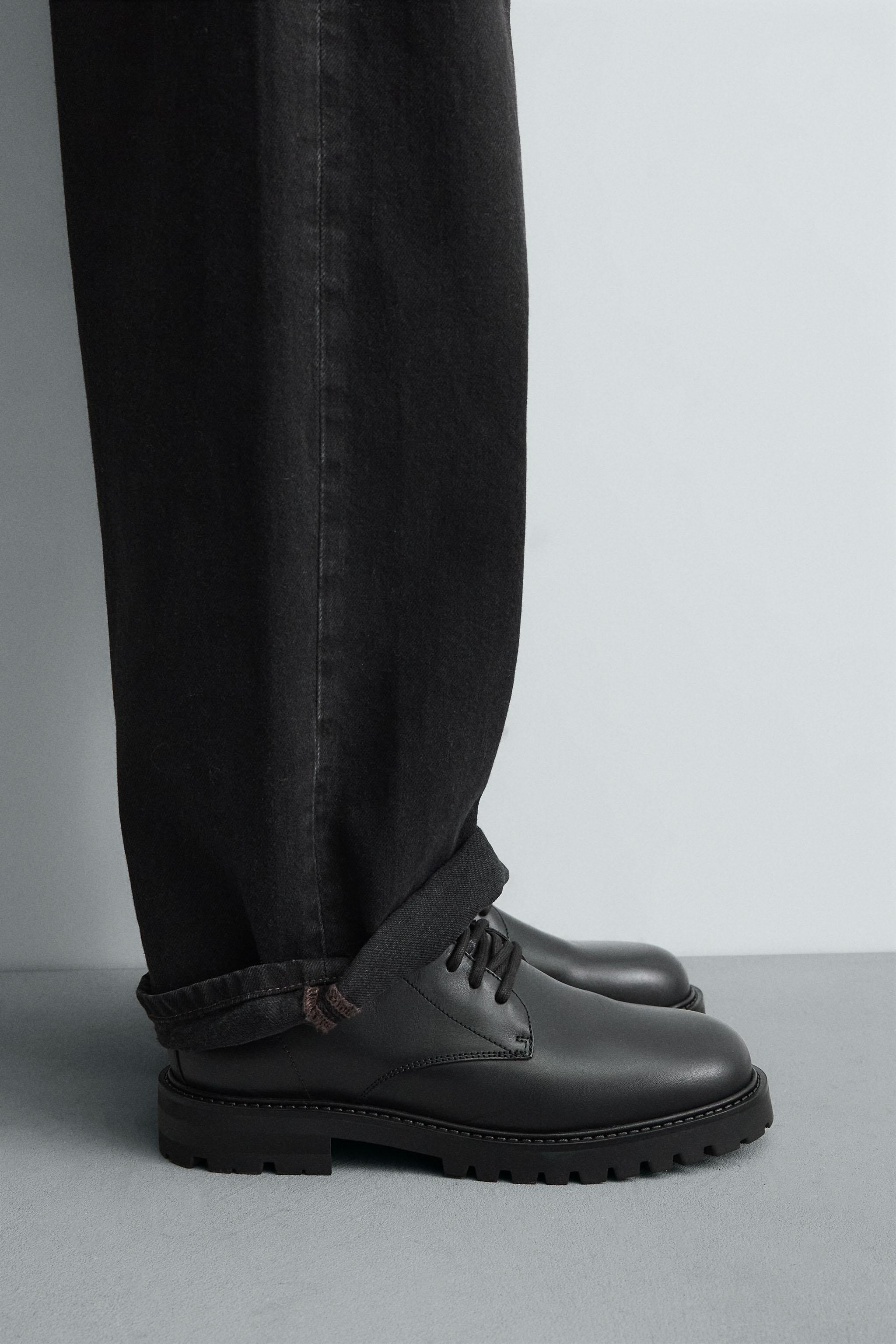 BOTTES À LACETS EN CUIR